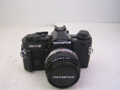 奥林巴斯OM-4 TI（钛金版）+奥林巴斯 50 F1.8镜头，套出1998元